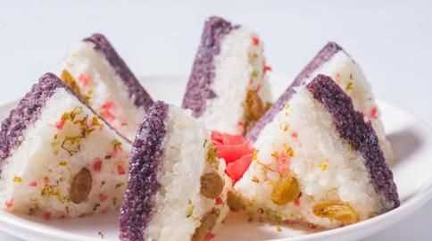 一個糍粑和一碗米飯的熱量哪個高